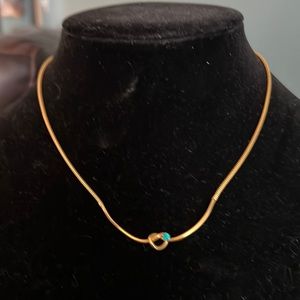 Vintage Signed Biagi Gold Love Knot Necklace with Emerald Green Crystal
